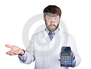 Close-up portrait of a medical doctor, he proposes to pay for treatment in pos-terminal. concept of high cost of the