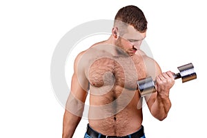Close-up portrait of Muscular guy doing exercises with dumbbells over white background