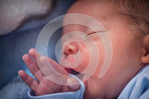 Close up portrait of a newborn baby boy sleeping