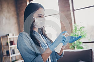 Close-up portrait of nice attractive healthy confident brunette girl using disinfection liquid sanitary soap safety