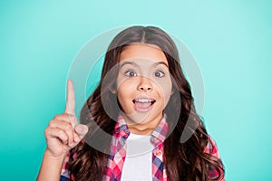 Close-up portrait of nice attractive lovely intelligent brainy clever cheerful wavy-haired pre-teen girl wearing checked