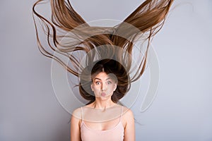 Close-up portrait of nice-looking attractive lovely pretty charming funky amazed brown-haired girl wind blowing perfect