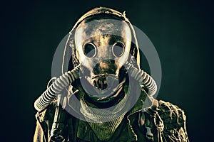 Portrait of post apocalyptic survivor in gas mask