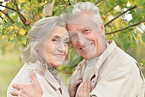 Portrait ofbeautiful senior couple hugging in the park