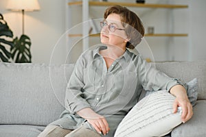 Close-up portrait of a older woman at home