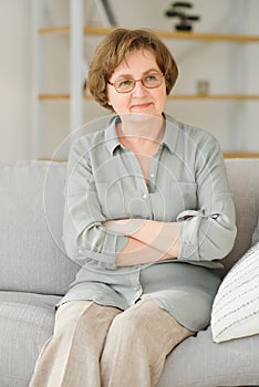 Close-up portrait of a older woman at home