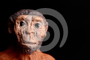 Close up portrait of a primitive man doll