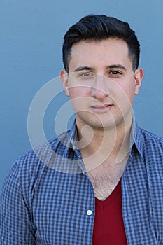 Close up portrait of real man. Undefined face expression