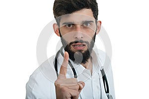 A close-up portrait of a rude, frustrated, upset doctor isolated on a white background