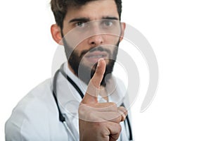 A close-up portrait of a rude, frustrated, upset doctor isolated on a white background