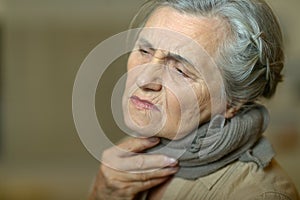 Close up portrait of sad ill senior woman