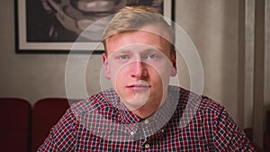 Close up. Portrait sad thoughtful man looking at the camera. Handsome calm serious man looking at camera.