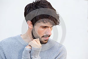 Close up sad young man staring