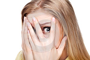 Close-up portrait of the scared woman.