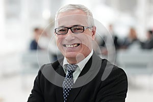 Close up portrait of senior businessman in office