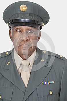 Close-up portrait of a senior male US military officer over gray background