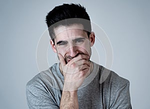 Human expressions and emotions. Portrait of young attractive sad and depressed man