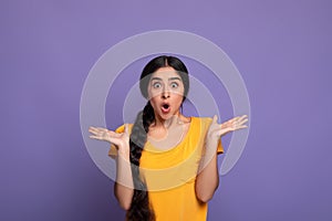 Close up portrait of shocked young indian woman