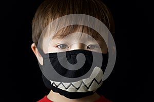 Young boy with mask