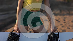 Close up portrait SLOW MOTION beautiful girl hipster athlete fashionable young woman in shorts and sunglasses takes a