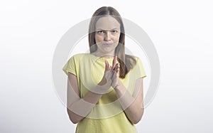 Close up portrait of sly, scheming young woman plotting something isolated on white background