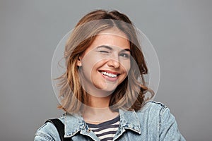 Close up portrait of a smiling happy teenage girl
