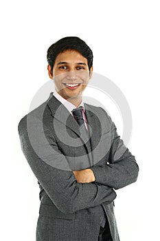 Close up portrait of a smiling Indian business man.