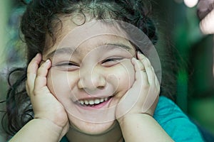 Close up Portrait of smiling Indian little girl