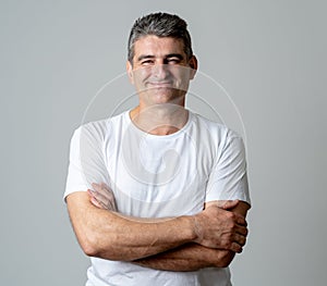 Close up portrait of a smiling and laughing mature man in happy face human emotions and expressions