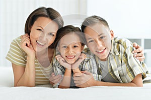 Close up portrait of smiling mother with children