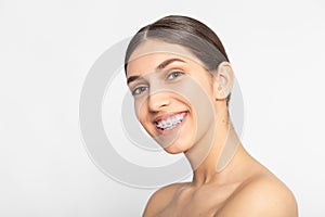 Close up portrait of Smiling Teen girl showing dental braces