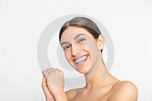 Close up portrait of Smiling Teen girl showing dental braces