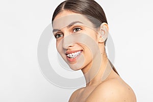 Close up portrait of Smiling Teen girl showing dental braces