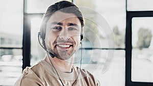 close-up portrait of smiling young support hotline worker