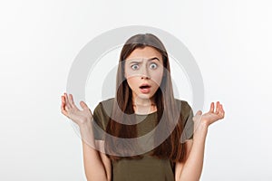 Close-up portrait of surprised beautiful girl holding her head in amazement and open-mouthed. Over white background