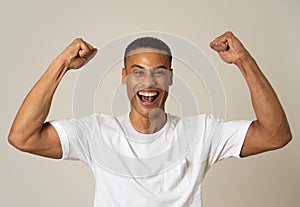 Close up portrait of surprised and happy man celebrating victory and wining team or lottery