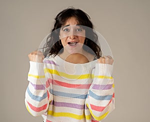 Close up portrait of surprised and happy woman celebrating victory success or wining lottery