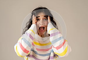 Close up portrait of surprised and happy woman celebrating victory success or wining lottery