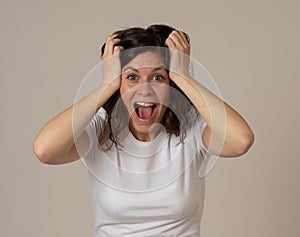 Close up portrait of surprised and happy woman celebrating winning lottery or victory