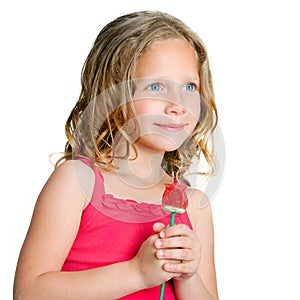 Close up portrait of sweet girl with candy rose.