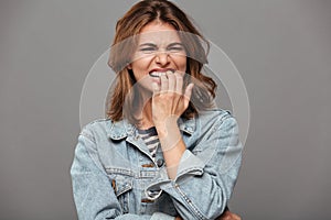 Close up portrait of a teenage girl in denim jacket