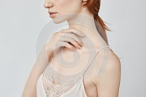 Close up portrait of tender young redhead girl.