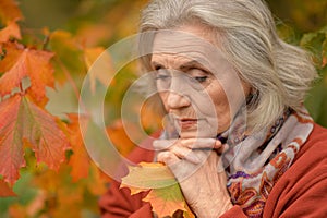 Close up portrait of thoughtful senior woman