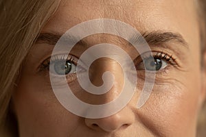 Close-Up Portrait of a Thoughtful Woman With Focus on Eyes and Expression