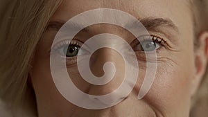 Close-Up Portrait of a Thoughtful Woman With Focus on Eyes and Expression