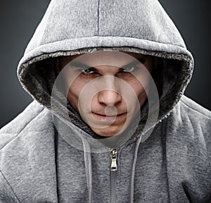 Close-up portrait of threatening thug photo