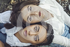 Close-up portrait of two girls. Protecting same-sex relationships. Feminism. Struggle for women`s rights