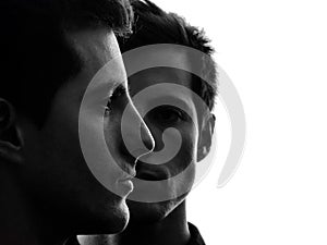 Close up portrait two men twin brother friends silhouette