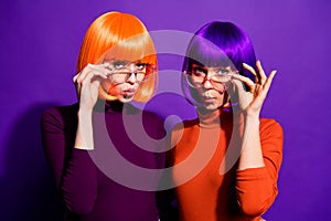 Close-up portrait of two nice attractive charming cute funny girlish girls wearing wigs pout lips touching specs