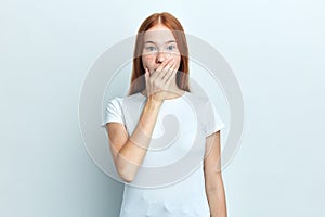 Close up portrait of upset scared hipster girl looking at the camera